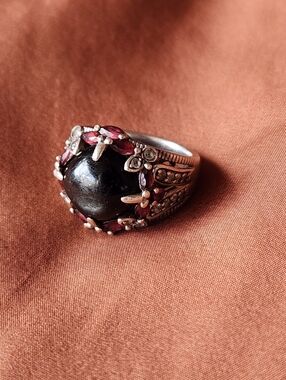 Vintage-Inspired Silver Ring with Black Cabochon and Red Marquise Accents